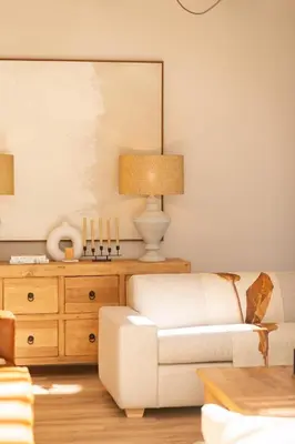 a living room with a couch and a table at Bikini House - With Pool in Hermanus
