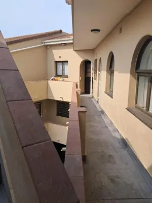 a view of an alley between two buildings at 8 Marina Sands beach apartment in Cape Town