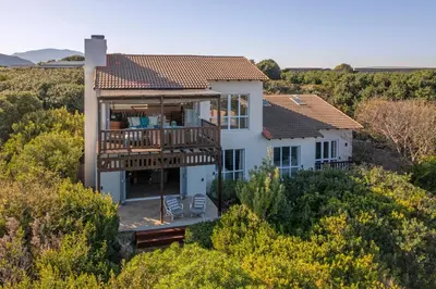 an aerial view of a house with a deck at Whispering Waves in Hermanus