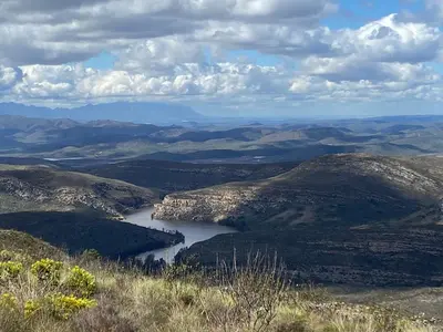 a view of a river in the middle of a valley at Skuilkrans Private Nature Reserve in McGregor