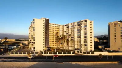a view of two tall buildings in a city at Elana Beachfront Condo in Strand