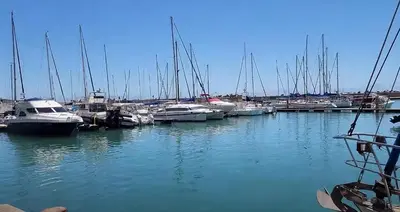 a bunch of boats docked in a harbor at Aqua Breeze in Cape Town