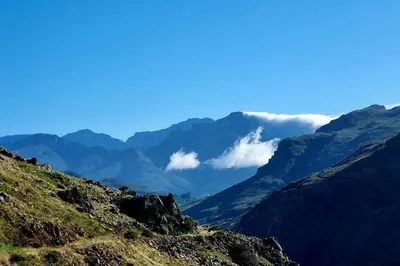 a view of a mountain range with clouds in the sky at C'est la Vie 2 in Franschhoek