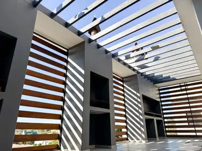 a house with a skylight in the ceiling at Greystone Executive Apartments in Cape Town