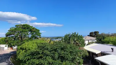 an aerial view of a house with trees at 45 on Luke in Hermanus
