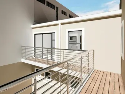 a balcony with a staircase in a building at Obs Centre Luxe Loft in Cape Town