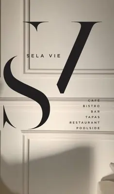 a sign with the letter k on a wall at Luxury Lodge 4F Pearl Valley Golf Estate in Simondium