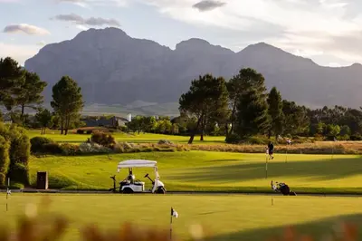 a golf course with mountains in the background at Pearl Valley Golf Estate Lodge 1E in Simondium