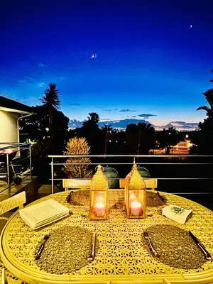 a table with three lights on top of it at Bonita Vista Plattekloof in Cape Town
