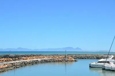 a group of boats are docked at a marina at Harbour View in Cape Town