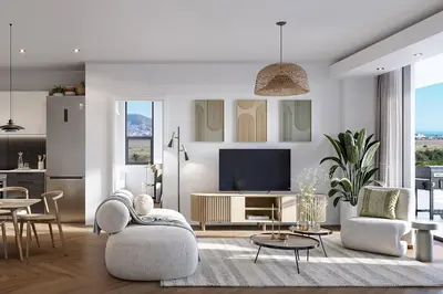 a living room with a couch and a tv at ParkPlace in Cape Town