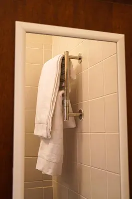 a towel hanging on a towel rack in a bathroom at 7 on Huis Piron in Stellenbosch