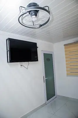 a flat screen tv on the ceiling of a room at one bedroom apartment A1 in Cape Town