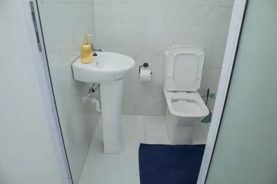 a bathroom with a sink and a toilet at One Bedroom apartment A3 in Cape Town