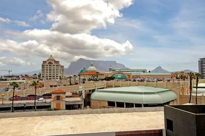 a view of a city with mountains in the background at Waters Edge Uno in Cape Town