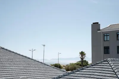 a view of the roofs of a building at Seabreeze at the Beach in Strand