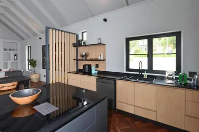 a kitchen with a sink and a counter top at 4 Bedroom Farm House in Brackenfell