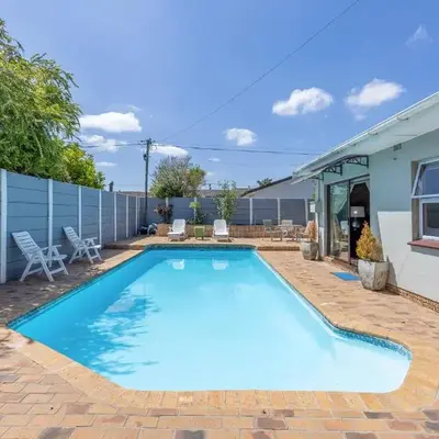 Spacious 4BR Home for 12 with a Private Pool and dedicated Braai BBQ Area