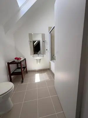 a bathroom with a toilet and a sink at Urban Oasis loft in Stellenbosch in Stellenbosch