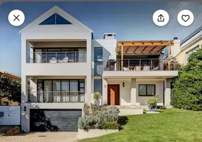 an image of a house with two windows at Onrus Beach House in Hermanus