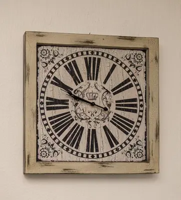 a clock that is on the side of a wall at Oceanfront Escape with Spacious Balcony Hermanus in Hermanus