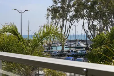 a view of a marina with cars parked in a parking lot at Gordonia 10 in Cape Town
