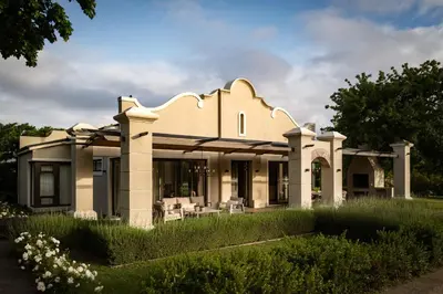 a house with a garden in front of it at Oakvale Estate in Franschhoek