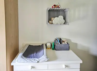 a white cabinet with a blanket on top of it at Indoor Pool Paradise in Stellies in Stellenbosch