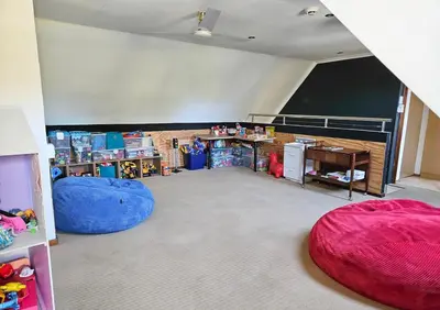 a room with two bean bags and a classroom at Indoor Pool Paradise in Stellies in Stellenbosch