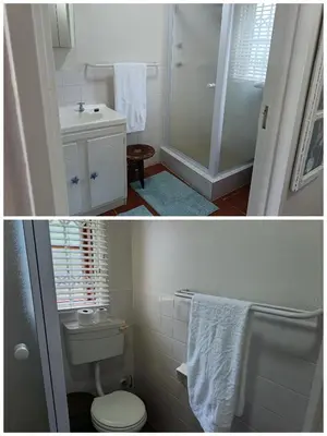 a bathroom with a toilet and a sink and a shower at Hes Se Gang family home,in Vermont in Hermanus