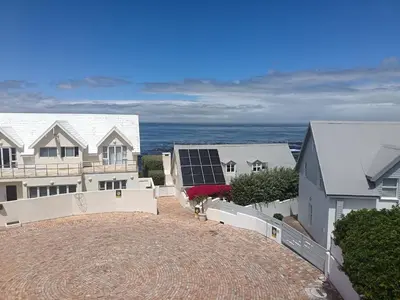 a view of a house with a solar panel at Hes Se Gang family home,in Vermont in Hermanus