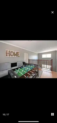 a room with a bed with a poker table in it at YA Eagle Wings Self Catering Shared Single room Apt B in Cape Town