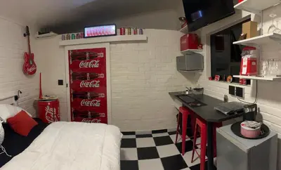 a room with a coca colaacistacistacistacist at The Cola Cabana in Cape Town