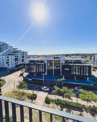 a view of a building from a balcony at Shalom on Matrix by Dajosha in Cape Town