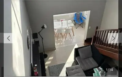 a living room with a couch and a dining room table at YA Eagle Wings Self Catering Shared Single room Lodge B in Cape Town