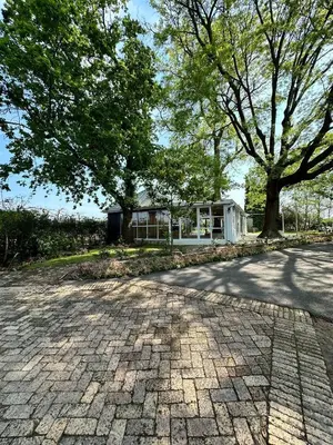 a brick road in front of a house at Blue Cottage, Elgin Grabouw in Grabouw