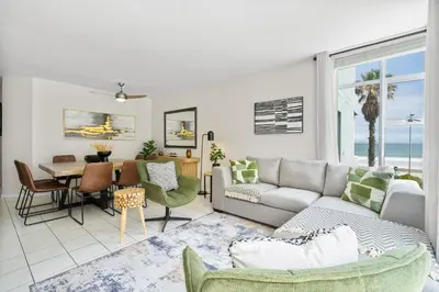 a living room with a couch and a table at 14 Cap dAzur by Host Agents in Cape Town