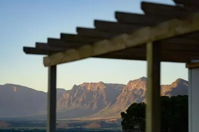 a view of a mountain range from a building at Breedekloof Kajuit in Romansrivier