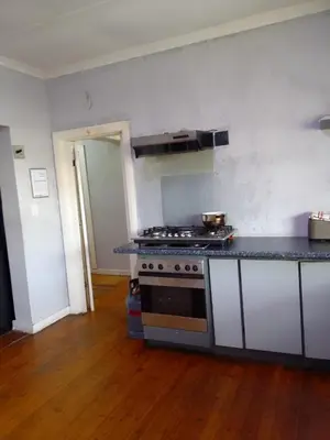 a kitchen with a stove and a counter top at At-home Oakdale Bellville in Bellville