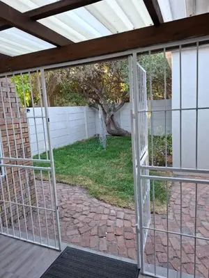 an open door to a patio with a yard at Chez Yves 2 in Hoheizen