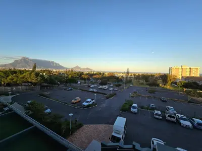an aerial view of a parking lot with parked cars at Sunset at Keys in Cape Town