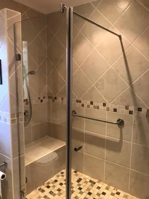 a shower with a glass door in a bathroom at Charming Self-Catering Apartment in Tygerberg Hills