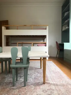 a dining room with a table and chairs and a bunk bed at Spacious Modern Home, Paarl Winelands in Paarl