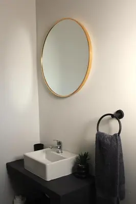 a bathroom with a sink and a mirror on the wall at Lategansrus at Helpmekaar Farm in Wellington
