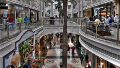 an overhead view of a shopping mall with people at Luxe at Nine Palms Near Canal Walk in Cape Town