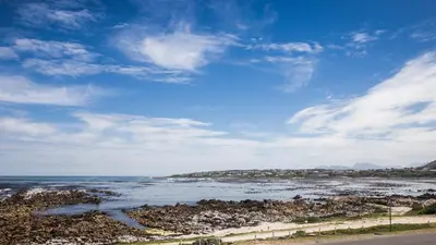 a view of the ocean on a sunny day at Geheim Luxury Seafront in Hermanus