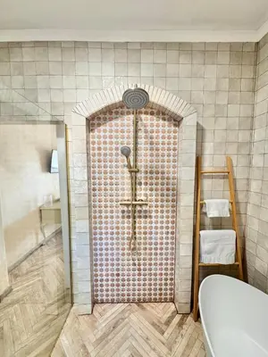 a bathroom with a shower with a tub and a toilet at Grande Casa - Central Stellenbosch in Stellenbosch