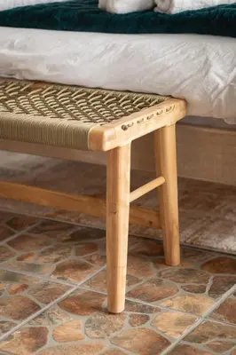 a wooden bench with a mattress on top of a floor at Hillside Hideaways - With Pool in Hermanus