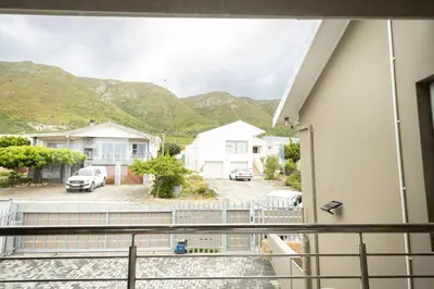 a view from the balcony of a house at Hillside Hideaways - With Pool in Hermanus