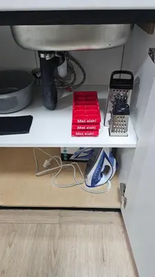 a white shelf with a sink under a kitchen counter at Victoria's Rest in Windsor Park